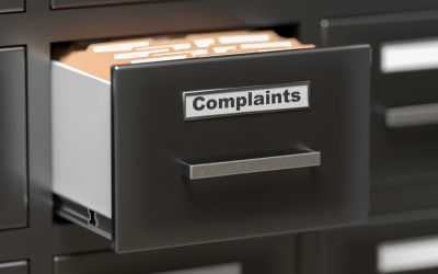 Photo of a file drawer with the label Complaints, to illustrate the article How to “Do All Things Without Complaining”